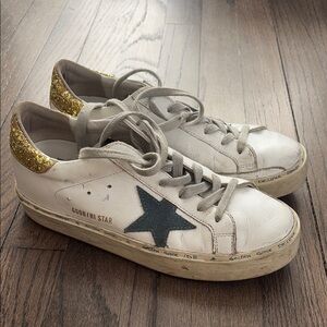 Golden Goose White Sneakers with Gold and Black Accents